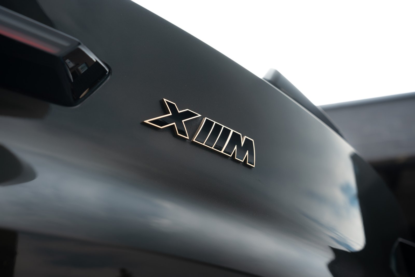 bmw xm new close up shot of the badge on trunk located at morendi vilnius lithuania