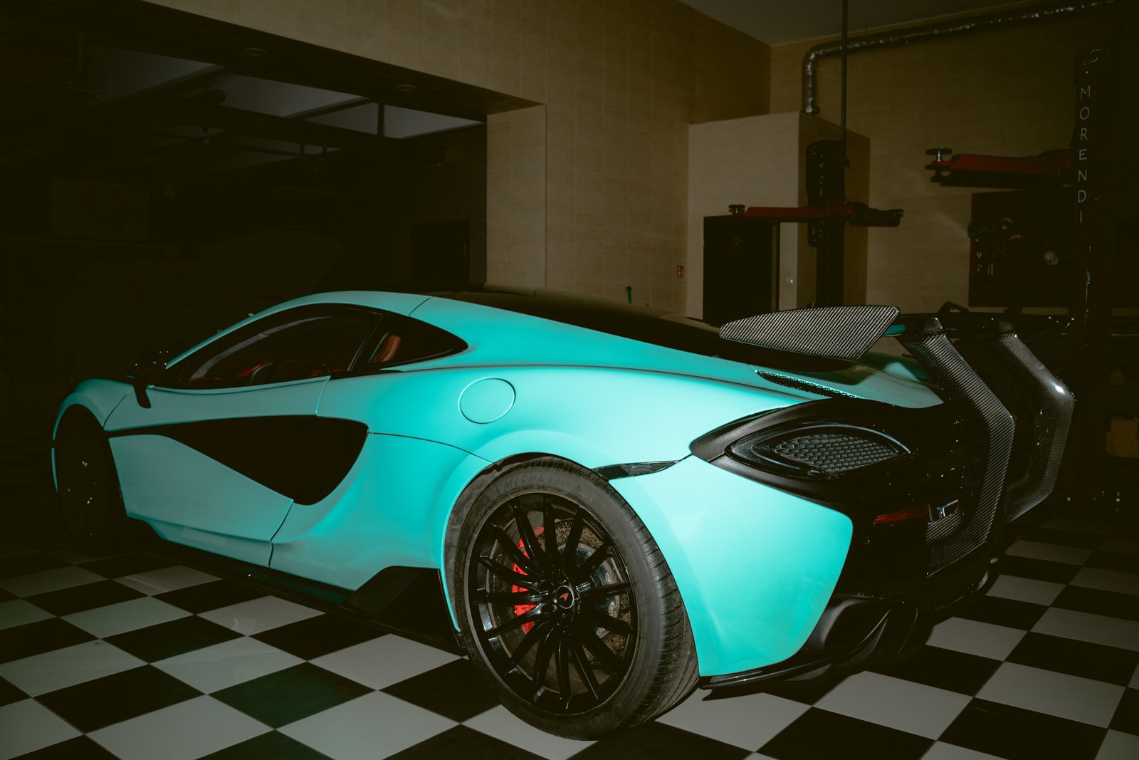 mclaren 570gt tiffany blue oldschool film photoshoot in morendi showroom vilnius lithuania